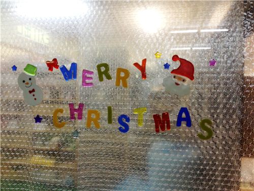 Our entrance doors are decorated with kawaii Christmas stickers
