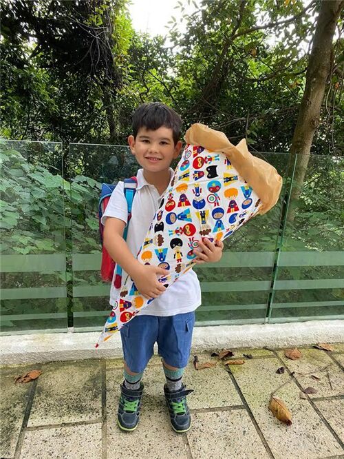 Mason looks very happy with his Schultüte!