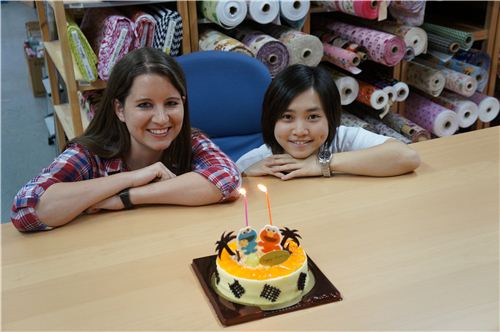Birthday Girls Sandra and Lok with their Cake