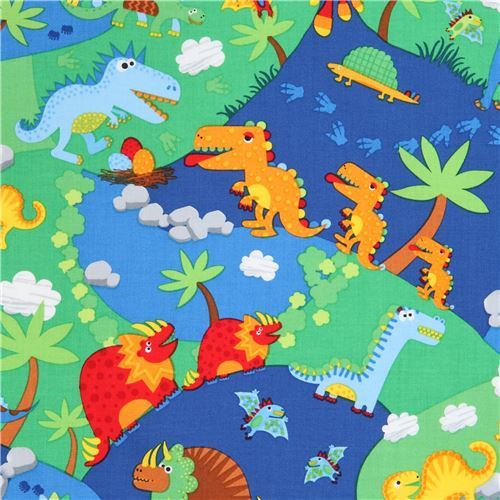 colorful dinosaur land fabric by Timeless Treasures