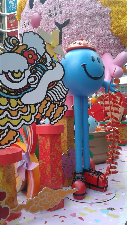 Check out the dancing lion next to Mr Tall!