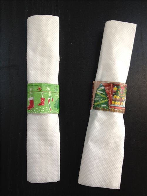 You just stick the tape on the cardboard stripes and glue the ends together