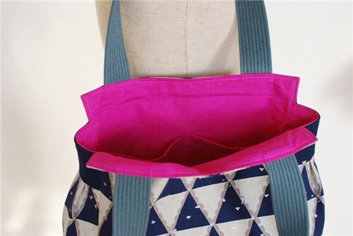 We love the contrasting material here