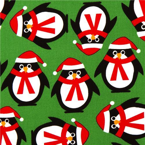 green Christmas fabric with penguins by Robert Kaufman