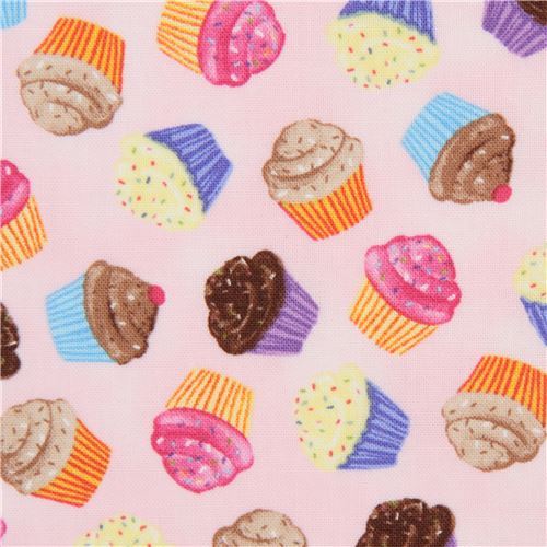 light pink fabric with colorful cupcakes by Timeless Treasures