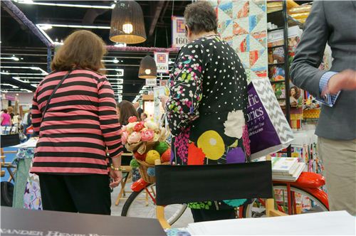 We also saw a woman at the Alexander Henry booth wearing a cute shirt made with echino fabrics