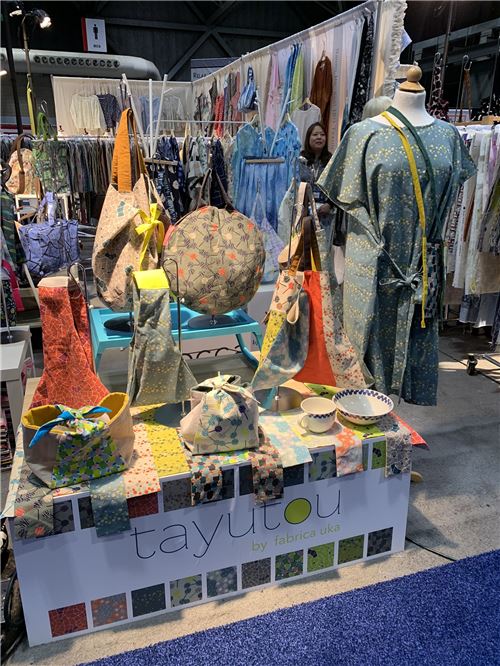 We are big fans of bag and clothes displays like this.