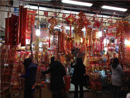 a stationery shop with CNY decoration in Tsim Sha Tsui at nighttime