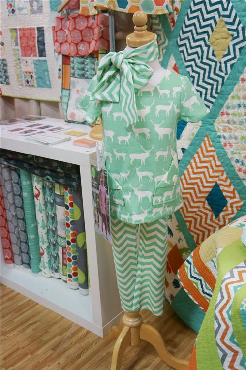 We love this two-piece in mint green made with birch fabric